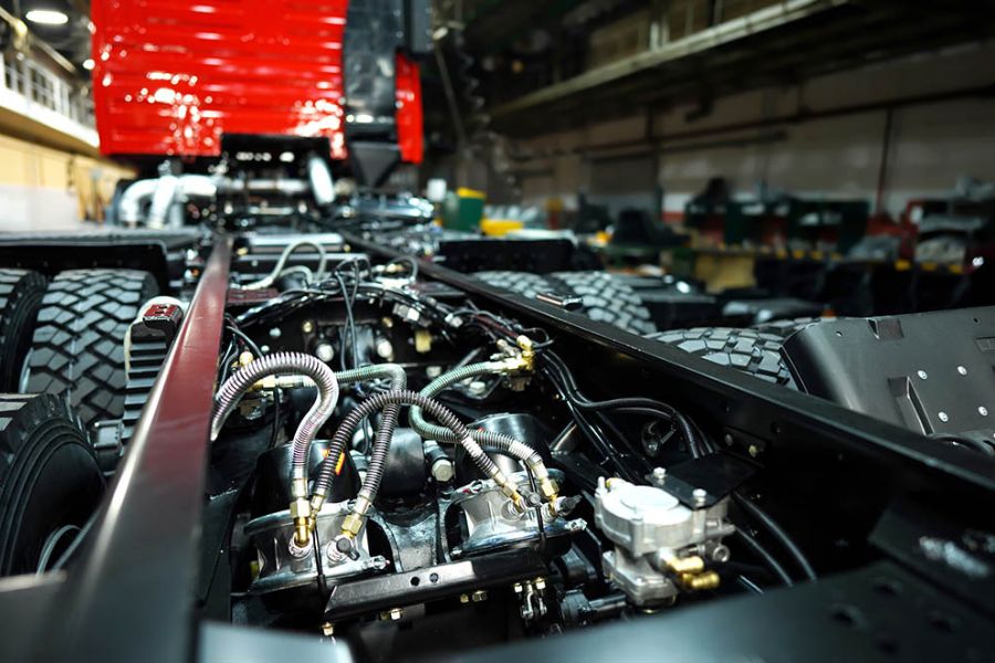 The inside machinery of a truck representing the manufacturing management services that are provided by Western High overseas The inside machinery of a truck representing the manufacturing management services that are provided by Western High overseas
